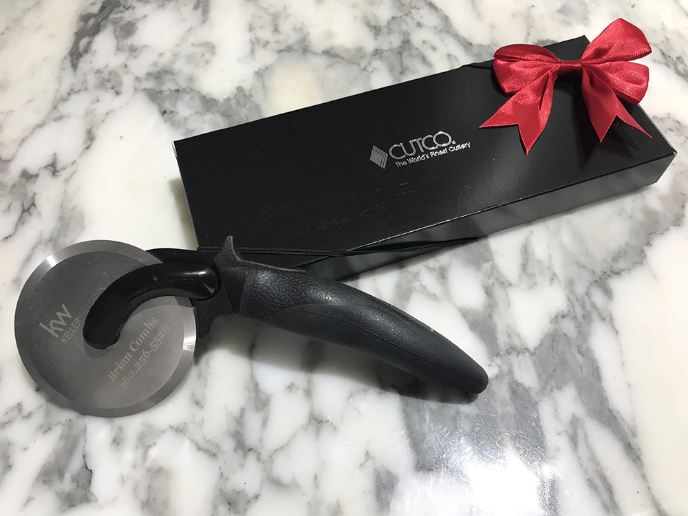 CUTCO Model 1838 Entertainer Set in special CUTCO gift box.   Includes 1501 Peeler, 1502 Pizza Cutter, 1503 Ice Cream Scoop, and 1504  Cheese